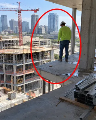 Site photo circled in red: unguarded elevated concrete slab edge with worker nearby